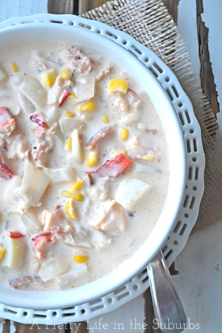 a top down image of a bowl of lobster corn chowder