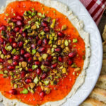a bowl of Festive Red Pepper Jelly Boursin Dip