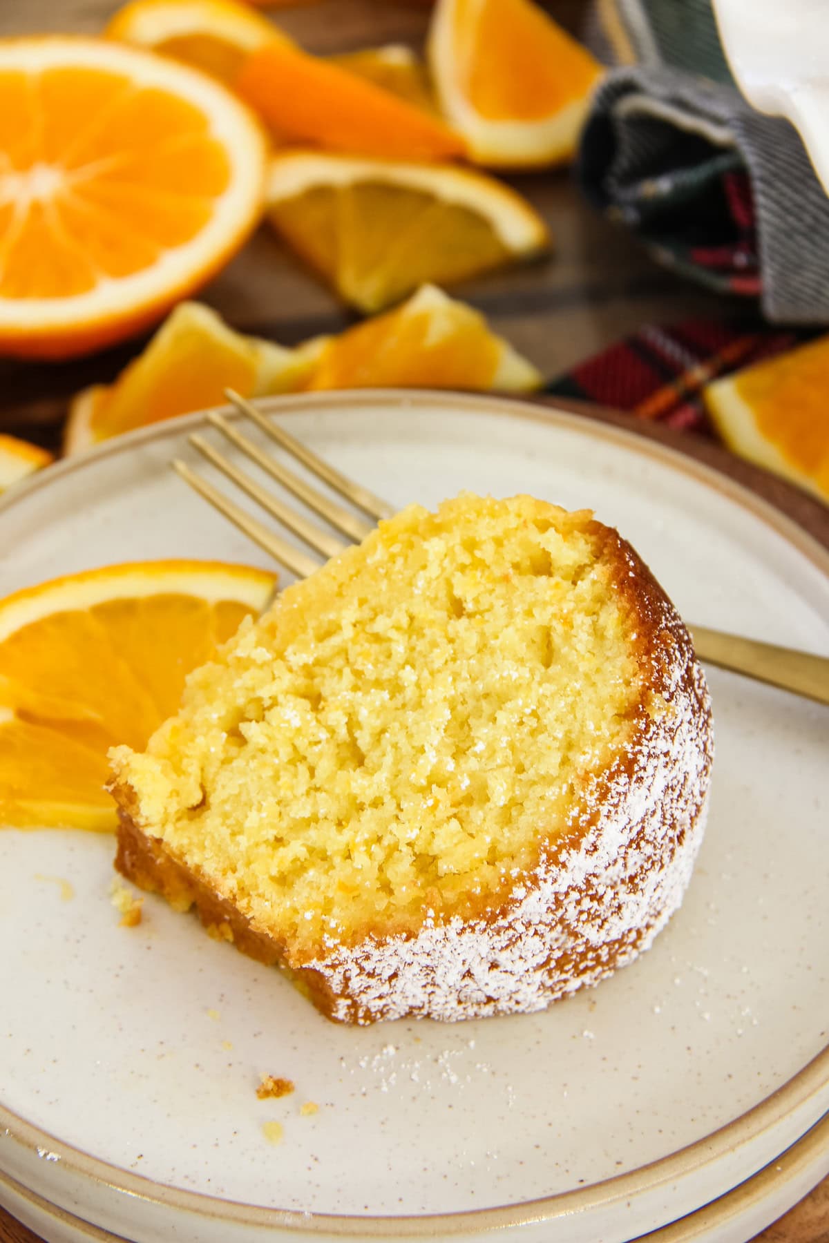 a slice of orange bundt cake