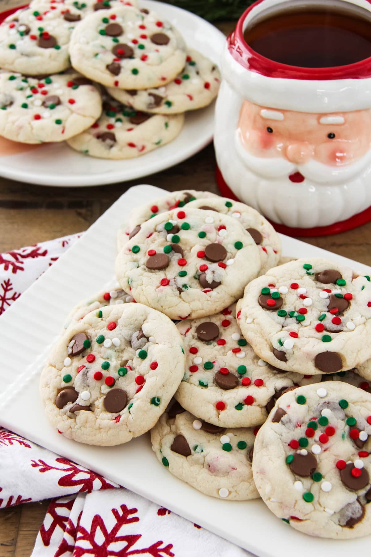 two plates of Santa's Cookies: White Cake Mix Cookies and a cup of tea
