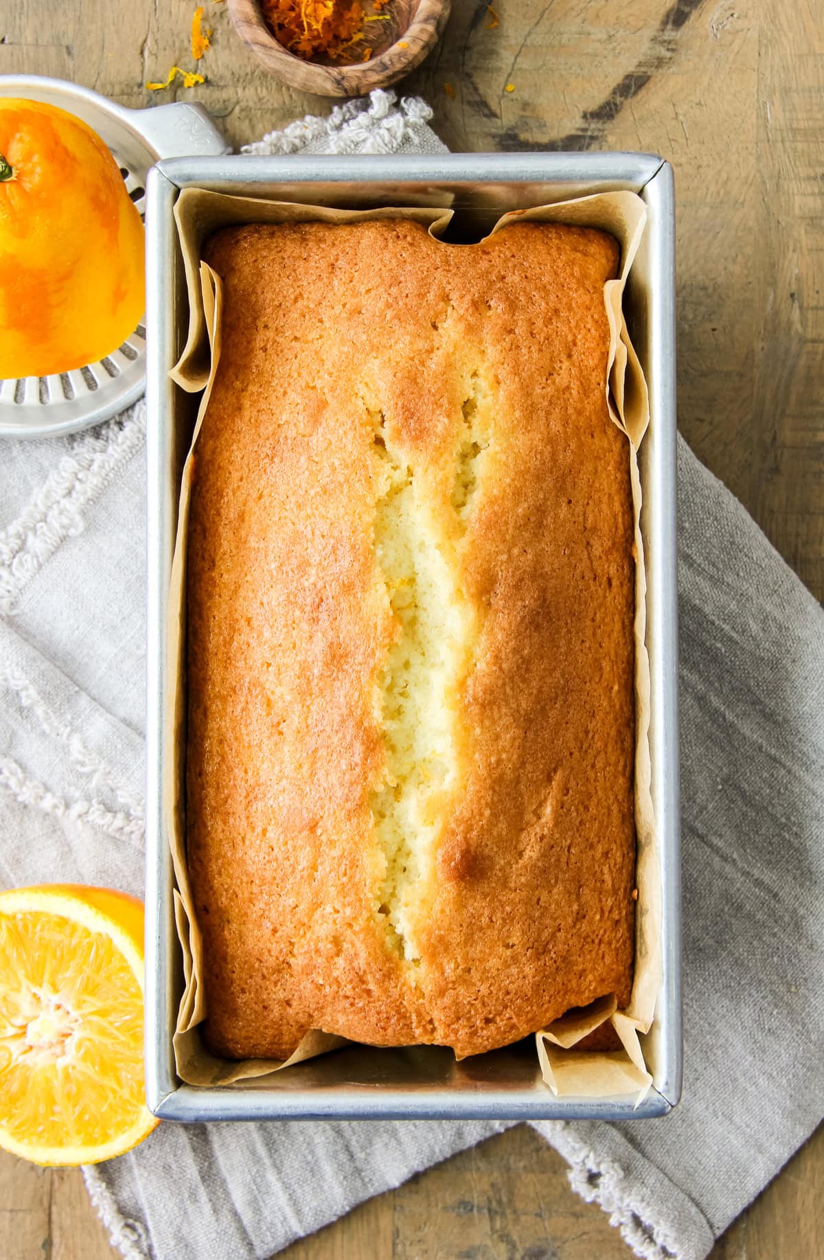 an orange loaf in a baking pan