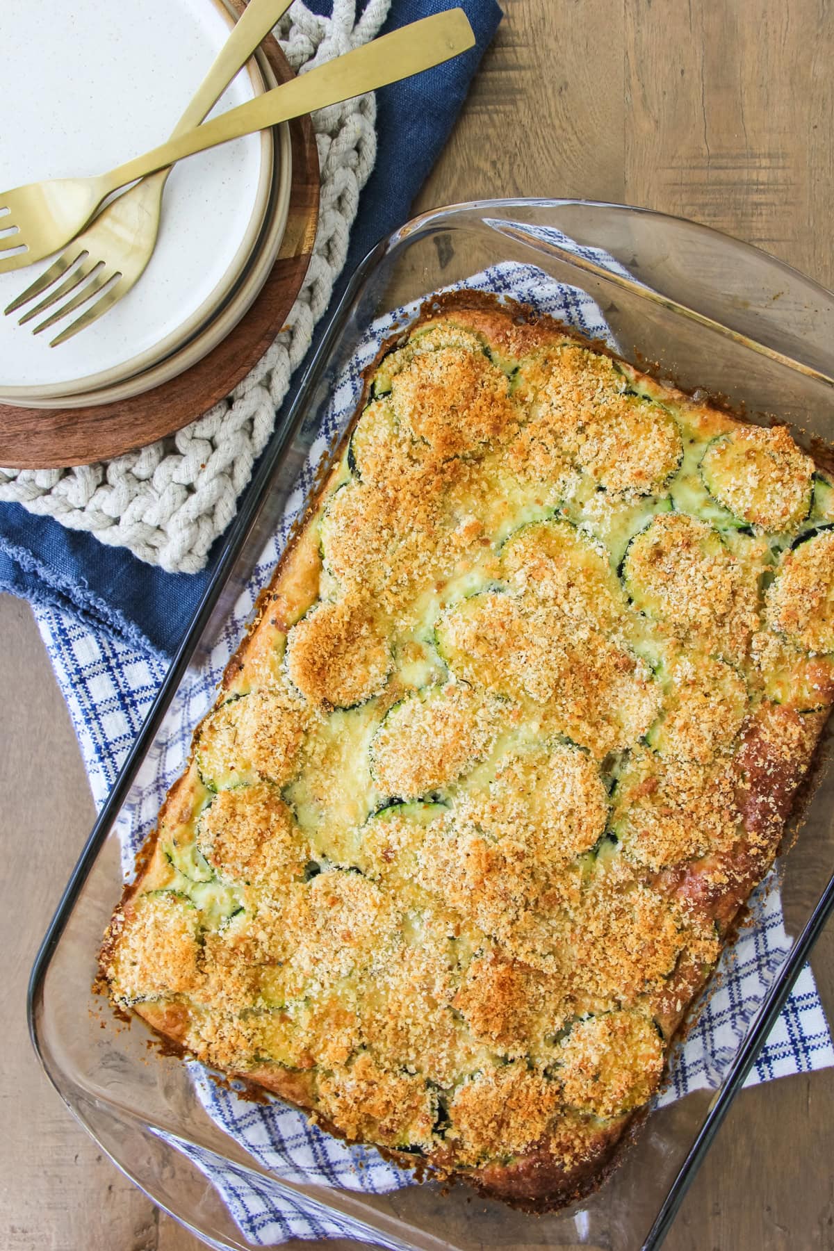 a top down image of a baking pan of crustless zucchini pie