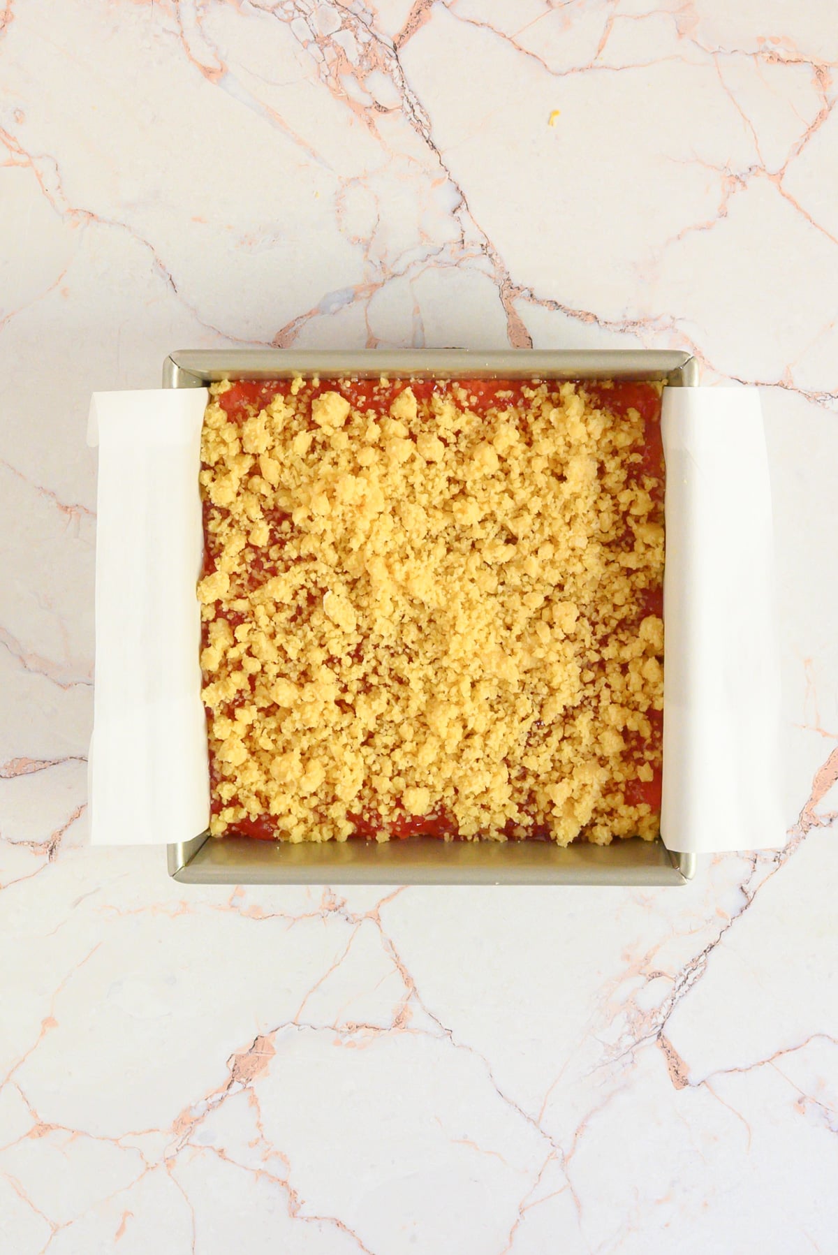 a top down image of Cheddar Cheese Shortbread with Apple Jelly in the baking pan